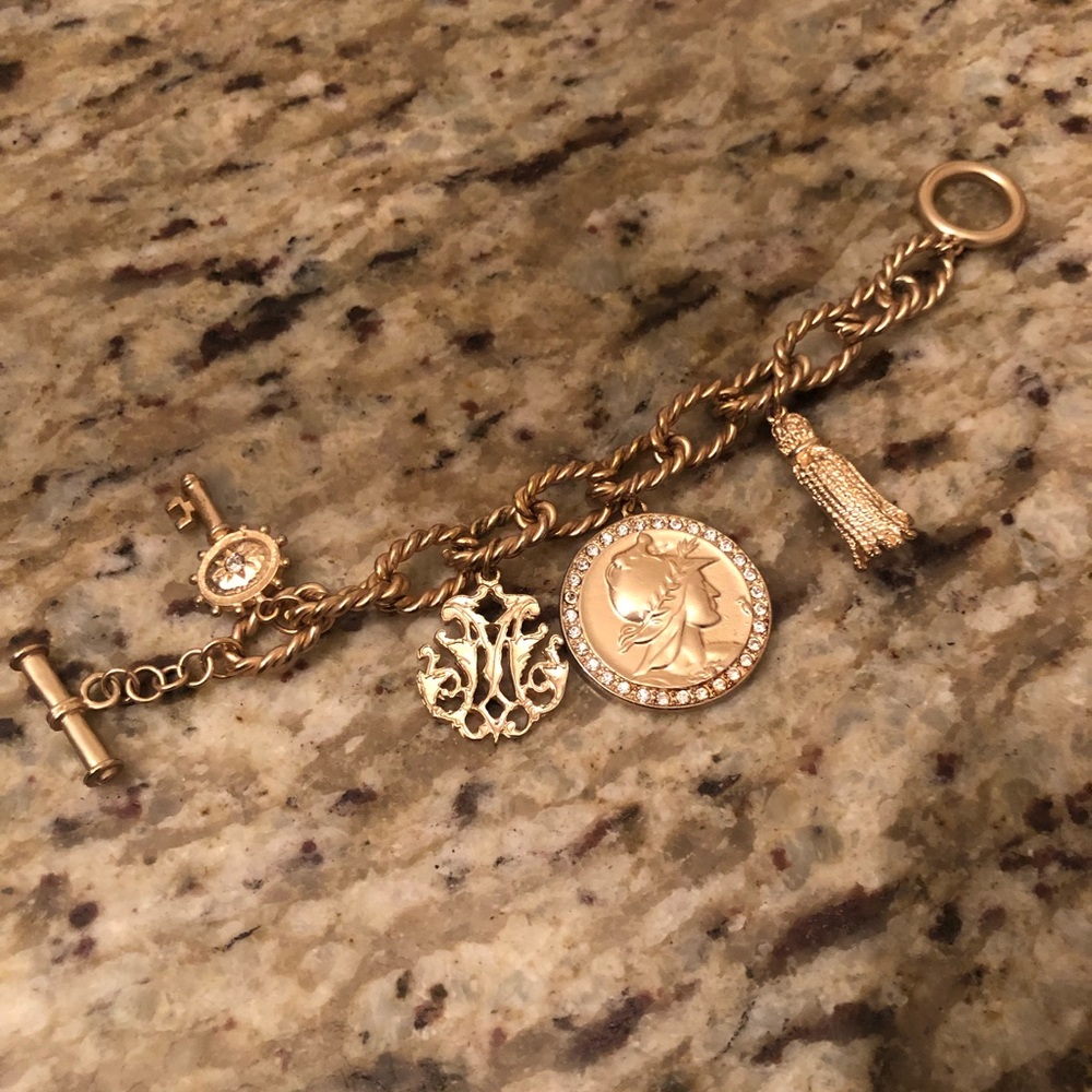 Gold tone charm bracelet